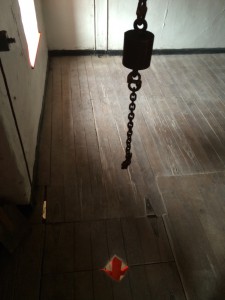 Chain used to move stuff to the top floor. Notice the hatch in the floor